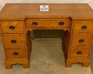 Lot 8269. $50.00 Vintage wood desk, needs love and paint!! 7 drawers and very heavy, will need help to move this piece. 46" W x 19" D x 30" T. It is very solid and HEAVY!