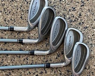 Lot 8271. $235.00. Women's Taylor-Made Miscela RH Clubs, Ultralite Graphite- Ladies Flex 7 (Irons- 7, 8, 9, P, S) & (Woods 1, 3, 4, 5, 7), Odyssey "White Hot" 2-ball blade putter. Excellent condition, Head covers may be available but aren't shown. What a deal!