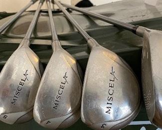Lot 8271. $235.00. Women's Taylor-Made Miscela RH Clubs, Ultralite Graphite- Ladies Flex 7 (Irons- 7, 8, 9, P, S) & (Woods 1, 3, 4, 5, 7), Odyssey "White Hot" 2-ball blade putter. Excellent condition, Head covers may be available but aren't shown. What a deal!