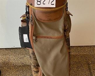 Lot 8272. $85.00. Vintage Bennington Golf Cart Bag, Brown and tan colors with golfers on bag. Lone Palm golf towel and 4 cammo head covers (Cover shown does not belong with this Bag, which btw was used by a woman golfer, and it's cute.