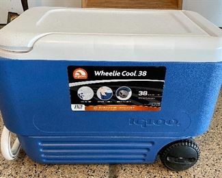Lot 8276. $45.00. 2 pc. Lot. 1) Igloo Cooler on wheels, Wheelie cool 38 qt, 52 can capacity. and 2) Coleman Termo De 2 Gal, beverage cooler jug, both in mint condition. Now get out and have a picnic!!