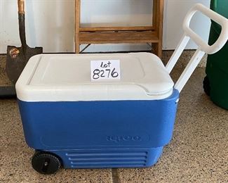 Lot 8276. $45.00. 2 pc. Lot. 1) Igloo Cooler on wheels, Wheelie cool 38 qt, 52 can capacity. and 2) Coleman Termo De 2 Gal, beverage cooler jug, both in mint condition. Now get out and have a picnic!!