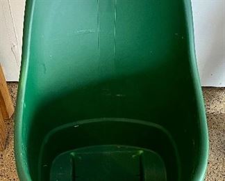 Lot 8778. $18.00 Green Garden cart on wheels. Perfect size for the garden and potting soil. Good condition.