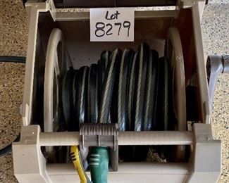 Lot 8279. $32.00 Ames True Temper Hose Reel Stand with hose and nozzle, "never leak hose" cabinet. small crack on top, negligible.