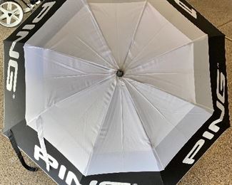 Lot 8281. $38.00. Ping Tour Golf Umbrella, Exc. Condition. Nice Cover for those wet golf outings. If you are a Ping Fan like me, this is a must have.