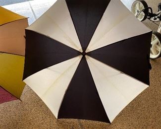 Lot 8283. $20,00 3 umbrellas. 1 golf umbrella, 1 reg, 1 compact travel. One for the car, one for the Golf Course and one for your office...