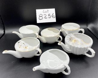 ot 8256. $50.00 Lot of 6 side-handled infant/hospital/invalid feeders primarily in white. 1) white & gold with a "Z" mark, 2) Chantilly white pattern, 3) Ribbed gold,4) white with gold 'Empireware England", 5) white with gold trim "MAW", 6) white body with gold trim that has rubbed away places.