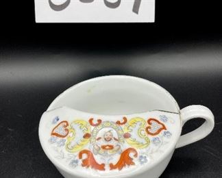 Lot 8257. $60.00. Lot of 6, side-handled infant/hospital/invalid feeders all with some design. 1) Red Cross, #4767 on bottom, 2) red, yellow & blue design and image of baby, 3) Red Cross/gold trim, marked "98" on bottom, 4) Pink & plum floral, marked "7317", 5) Purple floral with gold, 6) blue floral. Our favorite lot.