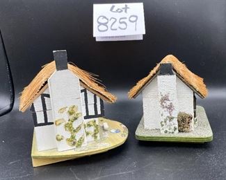Lot 8259. $60.00 5 pc lot of English Country decorative items: 1) Royal Doulton "Biddy Pennyfarthing" balloon lady figurine; 2) Antique Shoppe Music box with thatched roof 6" x 4" and marked RF Tam 2813183; 3) Cottage with thatche roof music box, Made in England; 4) Apothecary's Shoppe mini house by David Winter; 5) Lighthouse mini house.