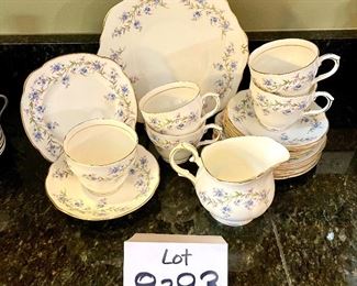 Lot 8293. $65.00 Ducchess bone china "Tranquility" Pattern, partial luncheon/tea set. 5 cups, 6 saucer, 6 square plates, 1 serving plate and a creamer. 19pc.