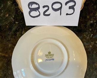 Lot 8293. $65.00 Ducchess bone china "Tranquility" Pattern, partial luncheon/tea set. 5 cups, 6 saucer, 6 square plates, 1 serving plate and a creamer. 19pc.