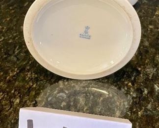 Lot 8295. $75.00. 10 pc. of White Fruits de blanc dinnerware serving pieces, featuring fruit decor in relief on all pieces, includes: 14" oval platter, covered butter dish, creamer, sugar, salt and pepper, gravy/saucer, 2 dinner plates or cookie plates, and a white Kaiser tankard or pitcher 9.5" T.