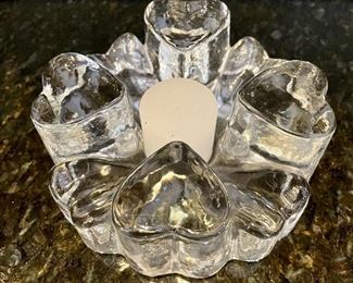 Lot 8297. $24.00. 4 candle holders, 2 Nachtmann crystal votives, one unmarked glass votive, and a ring of hearts candle holder or plate.