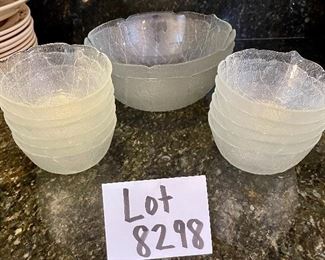 Lot 8298. $21.00. Two large glass salad set. includes 2 serving bowls. 11 individual salad bowls with a pressed leaf pattern.