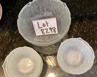 Lot 8298. $21.00. Two large glass salad set. includes 2 serving bowls. 11 individual salad bowls with a pressed leaf pattern.