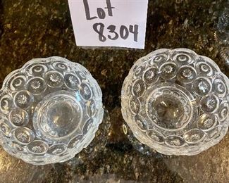 Lot 8304. $26.00 Lot of vintage glass serving pieces: 3- 9" plates with a bubble look; 2 small pedestal bowls; a large serving bowl (8.5" x 3"T); and a large 15" glass platter.