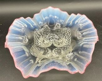 Lot 8308. $50.00. 4 pc lot of vintage art glass 1) clear, footed bowl with ruffled edge, 9" diam., 2) pearl white vaseline glass edge bordered in pink 7" diam;, and 3) pink murano style footed, ruffled art glass vase, possible Fenton, with 4). glass flowers 9" T.