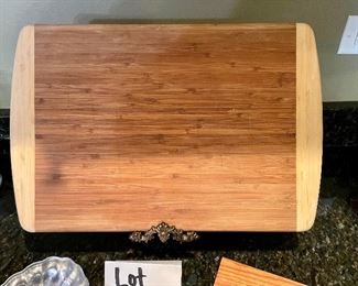 Lot 8310. $27.00 Lot of appetizer items. Bamboo cutting board (great for charcuterie too) 18" x 12"; cheese plane, cheese slicer, spreader, guillotine cheese slicer and an Armatelle dip bowl.