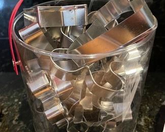 Lot 8313. $25.00 Calling all cookie monsters! Cookie press rolling pin, a large standard hard wood rolling pin and a bucket of cookie cutters. Let the fun begin!