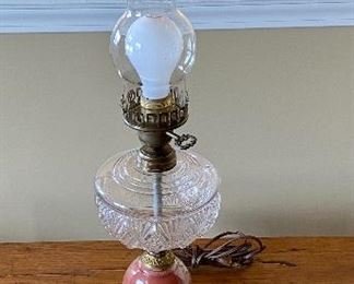 Lot 8332. $65.00 Vintage Electrified oil lamp with bulb. Cabin scene on base. 25" T x 5" diam. So Cute