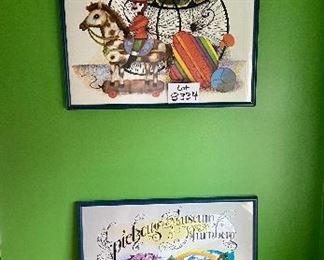 Lot 8334. $40.00 Set of 2 colorful Spielzeug Museum posters, framed in a blue frame.