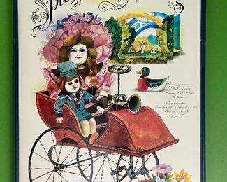 Lot 8334. $40.00 Set of 2 colorful Spielzeug Museum posters, framed in a blue frame.