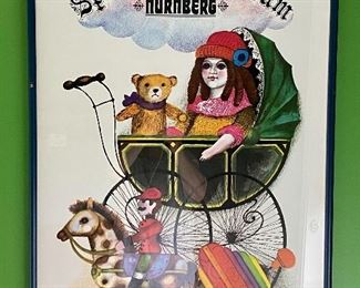 Lot 8334. $40.00 Set of 2 colorful Spielzeug Museum posters, framed in a blue frame.