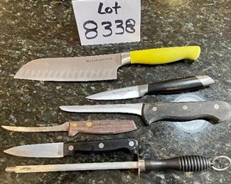Lot 8338. $28.00 Various knives; 2 Kitchen Aid knives (Chef's and paring); Ed Wusto Dreizackwerk fillet knife (4606); a paring knife' a Sheffield fillet knife and a wetstone rod for sharpening. Good deal!