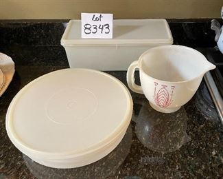 Lot 8343. $20.00 Vintage Tupperware measuring cup, round cupcake keeper, 14" bread saver.