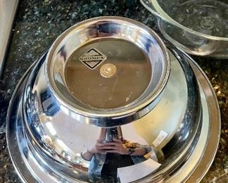 Lot 8344. $42.00 Vintage mid-Century modern Kromex serving bowl (11.5" diam) with in 8" glass insert, and a 'Kromex' tray with brass handles (17" L x 7" W)35 salad/dessert forks with glass buffet caddy.