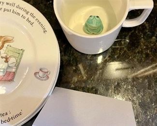 Lot 8348. $50.00. Beatrix Potter, Wedgewood , Peter Rabbit Nursery Set. Includes 3 cups, 3 plates & a bowl (1 plate is from Mrs. Tiggy-Winkle pattern) a bonus add on is a cute mug with a surprise frog at the bottom.