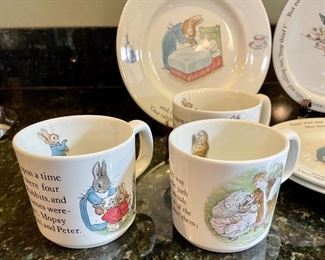 Lot 8348. $50.00. Beatrix Potter, Wedgewood , Peter Rabbit Nursery Set. Includes 3 cups, 3 plates & a bowl (1 plate is from Mrs. Tiggy-Winkle pattern) a bonus add on is a cute mug with a surprise frog at the bottom.