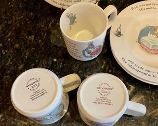 Lot 8348. $50.00. Beatrix Potter, Wedgewood , Peter Rabbit Nursery Set. Includes 3 cups, 3 plates & a bowl (1 plate is from Mrs. Tiggy-Winkle pattern) a bonus add on is a cute mug with a surprise frog at the bottom.