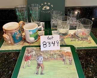 Lot 8349. $35.00. Golf beverage assortment including 5 Jason vintage golf scene placemats, 4 Old Fashioned glasses, each with an etched design of different courses - Augusta, Pinehurst, Firestone & Doral- with hole stats; 2 golf themed cups and 2 golf themed tumblers.