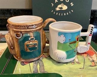 Lot 8349. $35.00. Golf beverage assortment including 5 Jason vintage golf scene placemats, 4 Old Fashioned glasses, each with an etched design of different courses - Augusta, Pinehurst, Firestone & Doral- with hole stats; 2 golf themed cups and 2 golf themed tumblers.