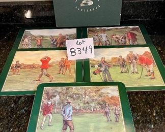 Lot 8349. $35.00. Golf beverage assortment including 5 Jason vintage golf scene placemats, 4 Old Fashioned glasses, each with an etched design of different courses - Augusta, Pinehurst, Firestone & Doral- with hole stats; 2 golf themed cups and 2 golf themed tumblers.