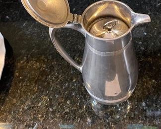 Lot 8352. $32.00 Calphalon stainless steel ice bucket/champagne bucket 7.5" T and a Landers, Frary & Clark Universal Butler (thermos pitcher with cork stopper).