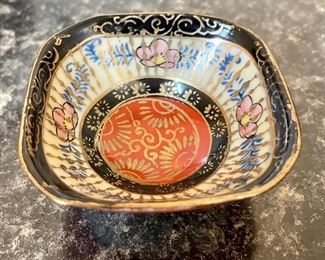 Lot 8353. $30.00 Nice metal and porcelain mixed lot, including: Enameled 10" pedestal bowl with animal character design; 8" porcelain dish with metal design mounted in metal plate holder and a 2.5" square porcelain decorative bowl.