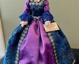 Lot 8361. $200.00. Lot of 11 hand-dressed English dolls made at 'The Little Gallery', Penzance. Included are: Edward VI, Sir Walter Raleigh, Henry VIII, and the following wives of Henry VIII; Anne Boleyn II wife of Henry, Anne of Cleves 4th wife of Henry, Catherine of Aragon, daughter of King Henry VIII, Jane Seymore 3rd wife of Henry, and the doll in the pink, dubbed Queen of hearts by HenryVIII. The dolls are no doubt Barbie's, however the costumes are period true and are truly amazing.