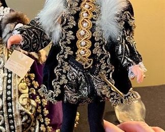Lot 8361. $200.00. Lot of 11 hand-dressed English dolls made at 'The Little Gallery', Penzance. Included are: Edward VI, Sir Walter Raleigh, Henry VIII, and the following wives of Henry VIII; Anne Boleyn II wife of Henry, Anne of Cleves 4th wife of Henry, Catherine of Aragon, daughter of King Henry VIII, Jane Seymore 3rd wife of Henry, and the doll in the pink, dubbed Queen of hearts by HenryVIII. The dolls are no doubt Barbie's, however the costumes are period true and are truly amazing.