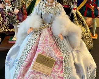 Lot 8361. $200.00. Lot of 11 hand-dressed English dolls made at 'The Little Gallery', Penzance. Included are: Edward VI, Sir Walter Raleigh, Henry VIII, and the following wives of Henry VIII; Anne Boleyn II wife of Henry, Anne of Cleves 4th wife of Henry, Catherine of Aragon, daughter of King Henry VIII, Jane Seymore 3rd wife of Henry, and the doll in the pink, dubbed Queen of hearts by HenryVIII. The dolls are no doubt Barbie's, however the costumes are period true and are truly amazing.