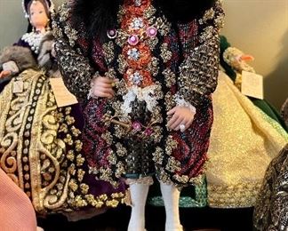 Lot 8361. $200.00. Lot of 11 hand-dressed English dolls made at 'The Little Gallery', Penzance. Included are: Edward VI, Sir Walter Raleigh, Henry VIII, and the following wives of Henry VIII; Anne Boleyn II wife of Henry, Anne of Cleves 4th wife of Henry, Catherine of Aragon, daughter of King Henry VIII, Jane Seymore 3rd wife of Henry, and the doll in the pink, dubbed Queen of hearts by HenryVIII. The dolls are no doubt Barbie's, however the costumes are period true and are truly amazing.