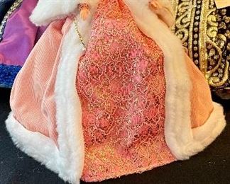 Lot 8361. $200.00. Lot of 11 hand-dressed English dolls made at 'The Little Gallery', Penzance. Included are: Edward VI, Sir Walter Raleigh, Henry VIII, and the following wives of Henry VIII; Anne Boleyn II wife of Henry, Anne of Cleves 4th wife of Henry, Catherine of Aragon, daughter of King Henry VIII, Jane Seymore 3rd wife of Henry, and the doll in the pink, dubbed Queen of hearts by HenryVIII. The dolls are no doubt Barbie's, however the costumes are period true and are truly amazing.