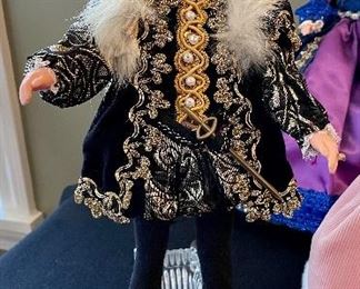 Lot 8361. $200.00. Lot of 11 hand-dressed English dolls made at 'The Little Gallery', Penzance. Included are: Edward VI, Sir Walter Raleigh, Henry VIII, and the following wives of Henry VIII; Anne Boleyn II wife of Henry, Anne of Cleves 4th wife of Henry, Catherine of Aragon, daughter of King Henry VIII, Jane Seymore 3rd wife of Henry, and the doll in the pink, dubbed Queen of hearts by HenryVIII. The dolls are no doubt Barbie's, however the costumes are period true and are truly amazing.
