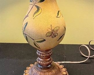 Lot 8366. $30.00 Table lamp with Floral and butterfly design. Broken on base as shown. 31" T