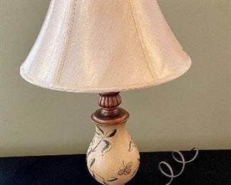 Lot 8366. $30.00 Table lamp with Floral and butterfly design. Broken on base as shown. 31" T