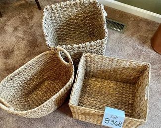 Lot 8368. $65.00 Lot of 3 Woven grass baskets with handles. 1) 16" x 14" x 12" T, 2) 15" x15" x 14" T, 3) 17" x 11" x 15.5" T