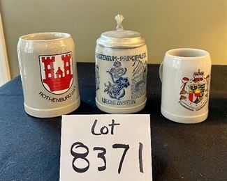 Lot 8371. $18.00. Three German Stoneware Beer Steins. as shown: 1) Rothenburg ODT; 2) Fustentue-Principality of Liechtenstein w/lid, 3) Furstentum Liechtenstein Stein