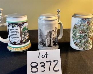 Lot 8372. $60.00 Lot of 3 German covered Beer Steins as shown.