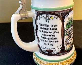 Lot 8372. $60.00 Lot of 3 German covered Beer Steins as shown.